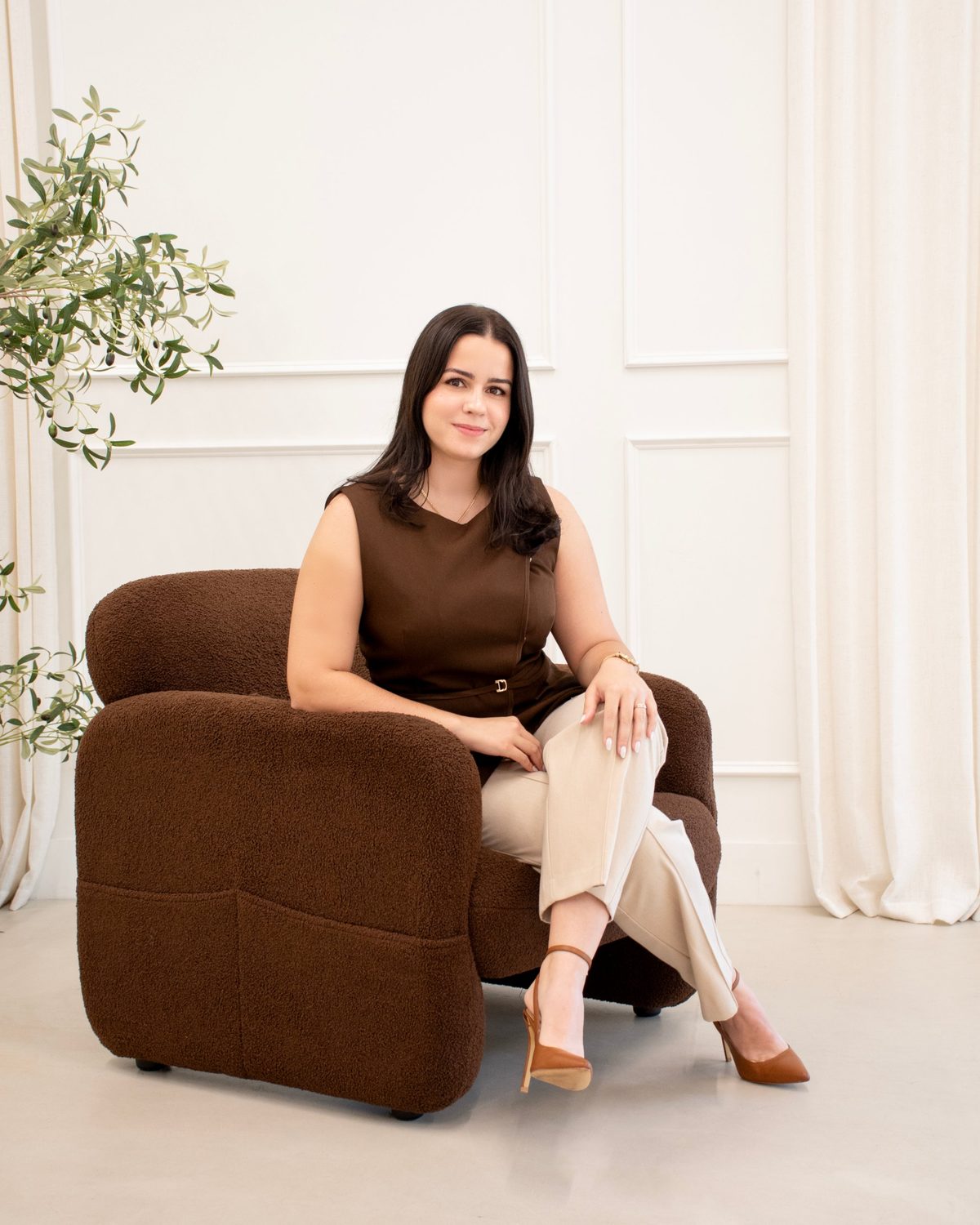 Attorney Gipsy Sosa Valdes seated in the office